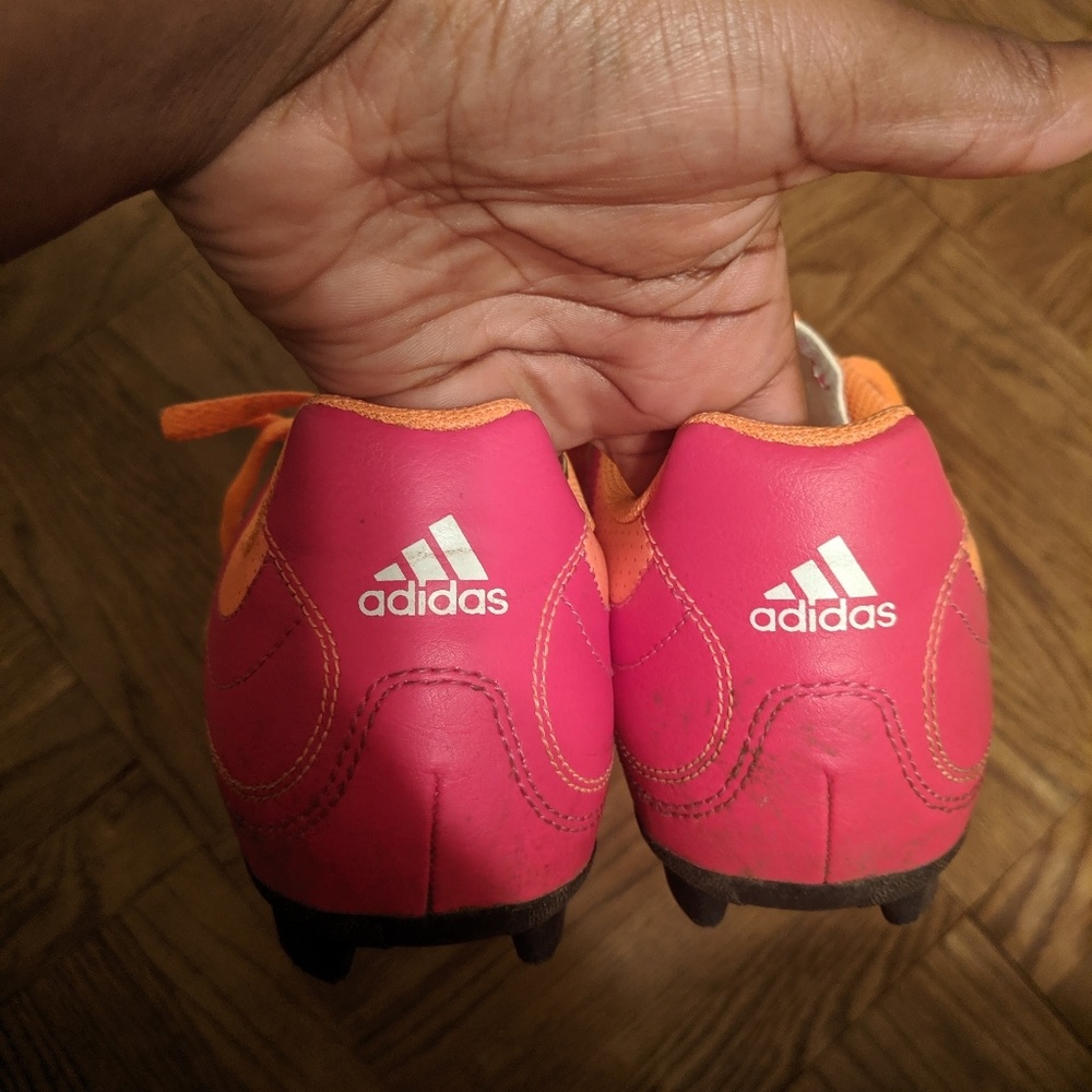 Adidas neon pink and orange soccer cleats